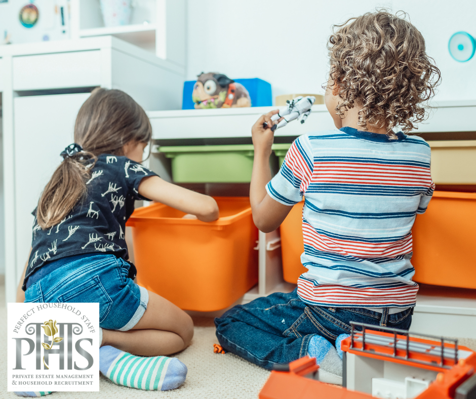 Brother and sister putting toys away in their places, demonstrating teamwork and effective strategies for managing siblings..